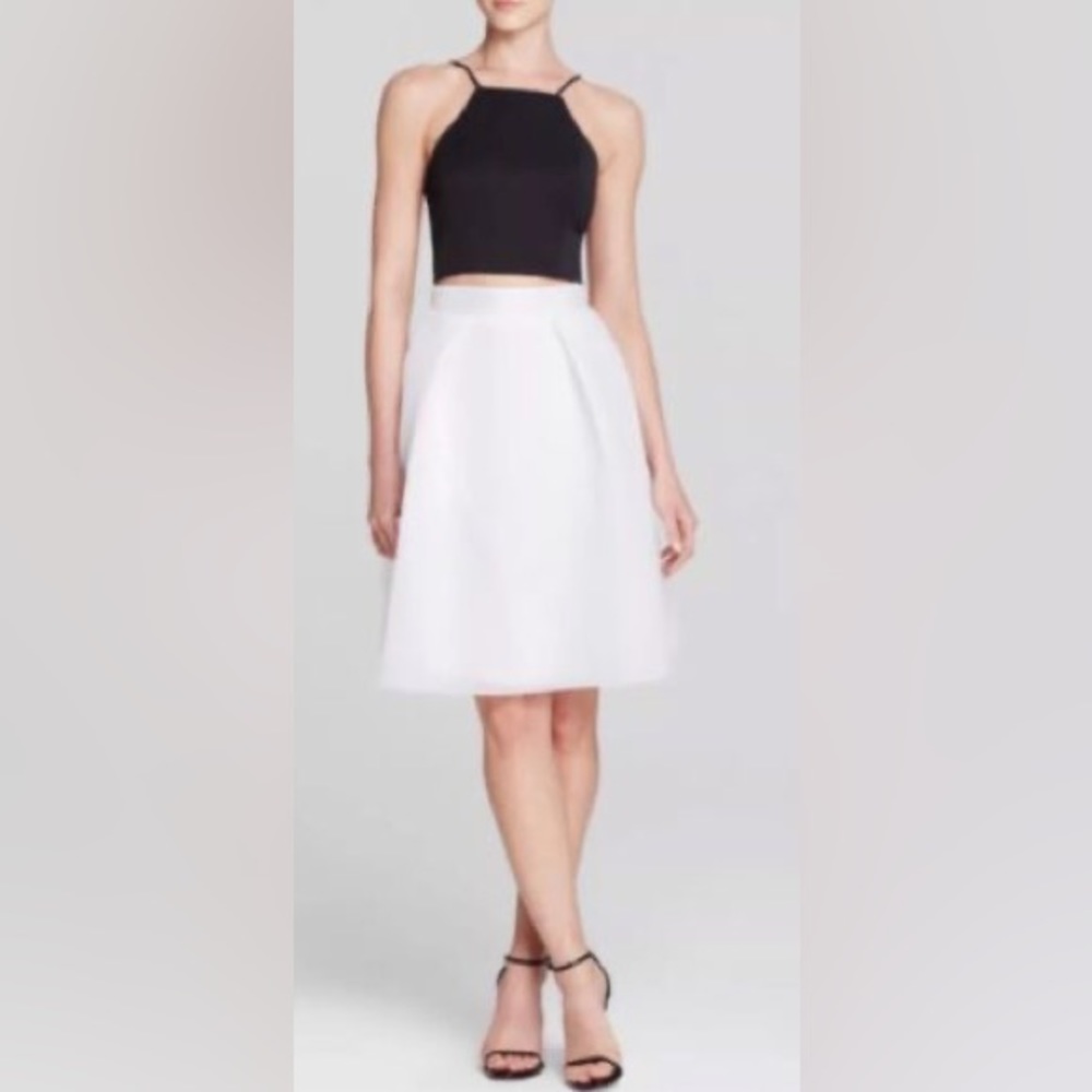 Used black halo crop top and skirt.